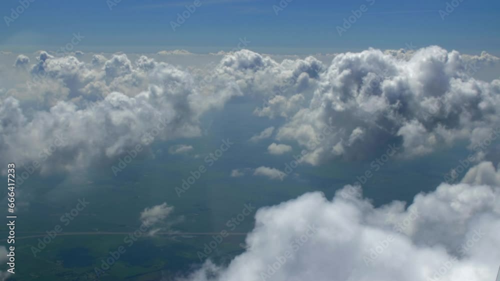4K Aerial Paralax Through Clouds Airplane Flying 4K Aerial Paralax Through Clouds Airplane Flying