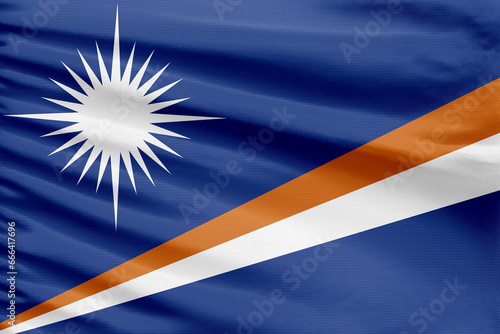 Marshall Islands flag background is depicted on a sport stitch cloth fabric with folds.