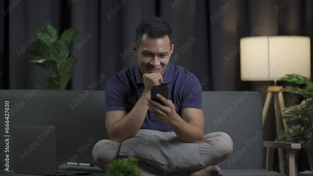 Happy positive businessman in a formal suit talking with a customer or friend. Having a conversation with a colleague talking on a smartphone while sitting in a modern office. Happy positive businessman in a formal suit talking with a customer or friend. Having a conversation with a colleague talking on a smartphone while sitting in a modern office.