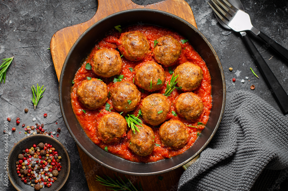 Meatballs in Tomato Sauce, Homemade Meatballs in a Pan on Dark Background Meatballs in Tomato Sauce, Homemade Meatballs in a Pan on Dark Background