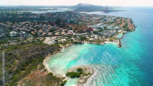 Aerial parallax above Zanzibar beach, Jan Thiel, Curacao on beautiful blue sky day photo