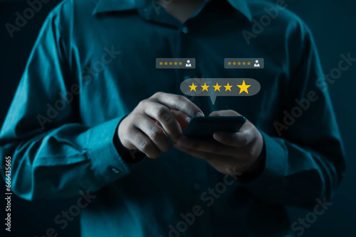human hand showing 5-star performance that has quality and press level excellent rank for giving the best score point to review the service, business concept Customer Service Experience, and Business