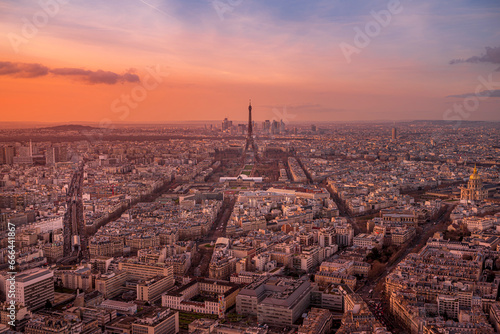 View of the Eiffel Tower and Paris skyline at sunset, France.