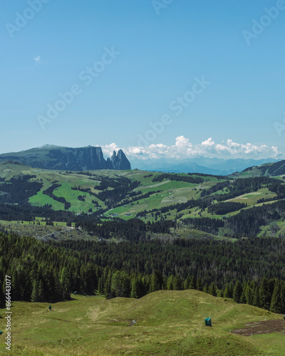 View of Sciliar Rosengarten Nature Park on Alpe di Siusi (Seiser Alm) on the Dolomites mountains, Val Gardena, South Tyrol, Trentino, Italy. photo