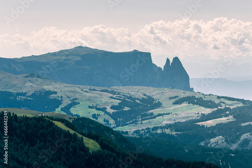 View of Sciliar Rosengarten Nature Park on Alpe di Siusi (Seiser Alm) on the Dolomites mountains, Val Gardena, South Tyrol, Trentino, Italy. photo