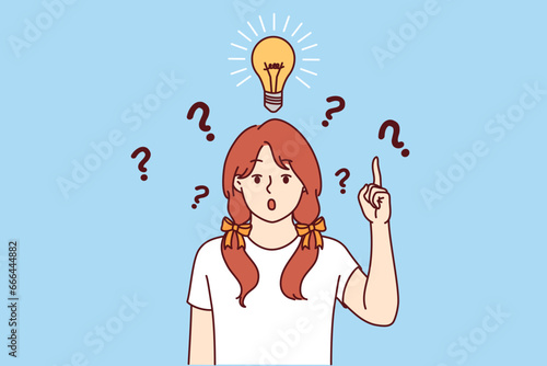 Little girl with light bulb above head says eureka and points up indicating presence of idea to solve problem. Child prodigy comes up with brilliant idea and opens mouth in surprise
