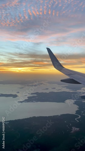 Watch the beautiful view of the expanse of clouds from the plane window