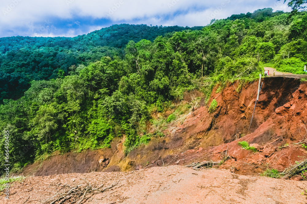 Landscape shot of dangerous landslide in the Indian forest.