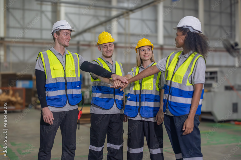 Multicultural Cardboard Workers fostering Success through Collaborating Teamwork on Production Line Multicultural Cardboard Workers fostering Success through Collaborating Teamwork on Production Line