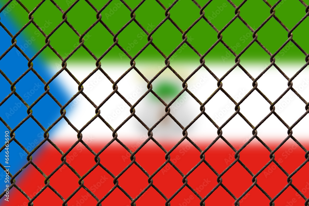 A steel mesh against the background of the flag Equatorial Guinea. A steel mesh against the background of the flag Equatorial Guinea.