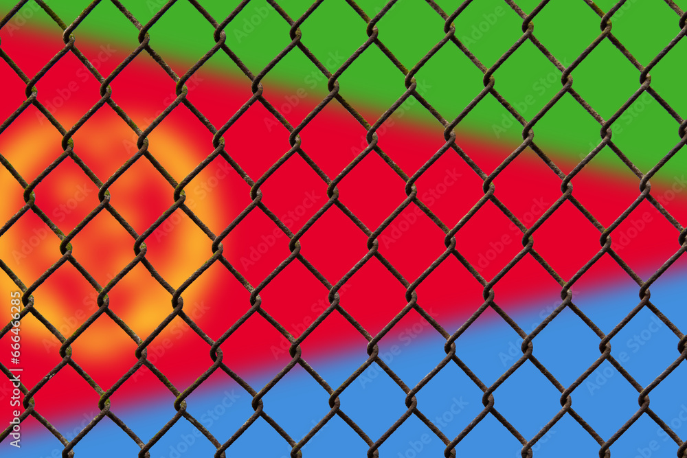 Fototapeta premium A steel mesh against the background of the flag Eritrea.