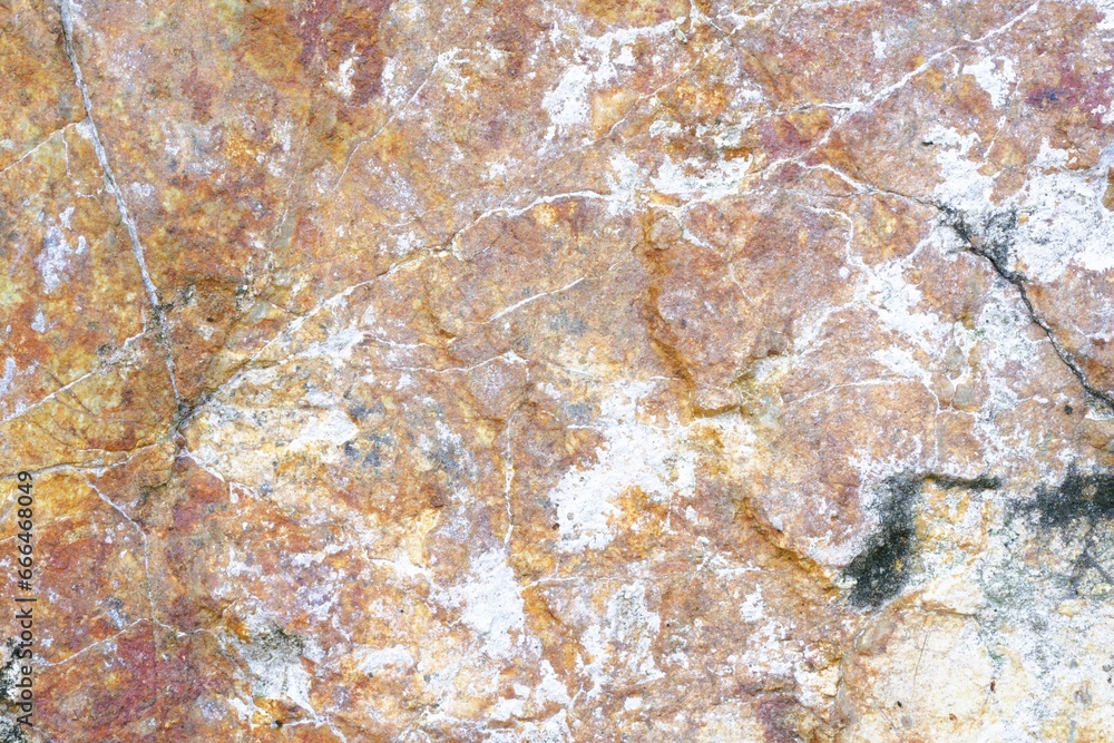 Texture PhotoThe red-orange stone floor has a few cracks.