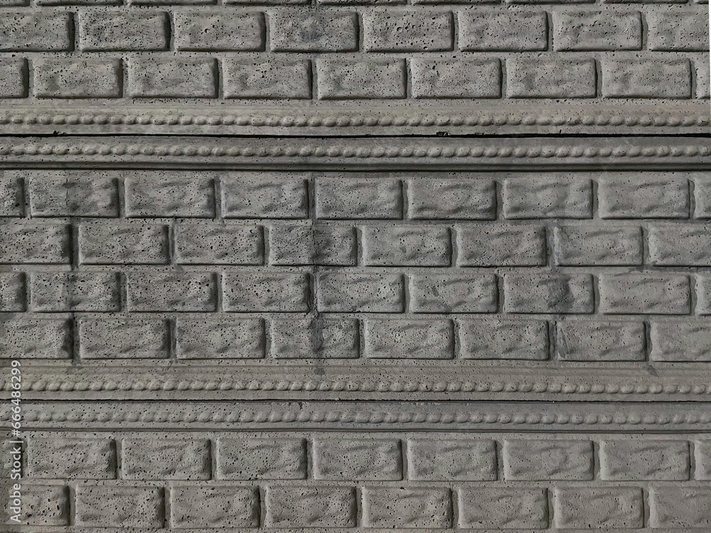 fence made of poor bricks and slabs with a texture pattern fence made of poor bricks and slabs with a texture pattern