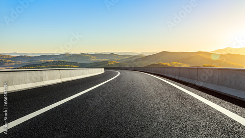 Highway road and mountain natural scenery at sunrise. panoramic view.