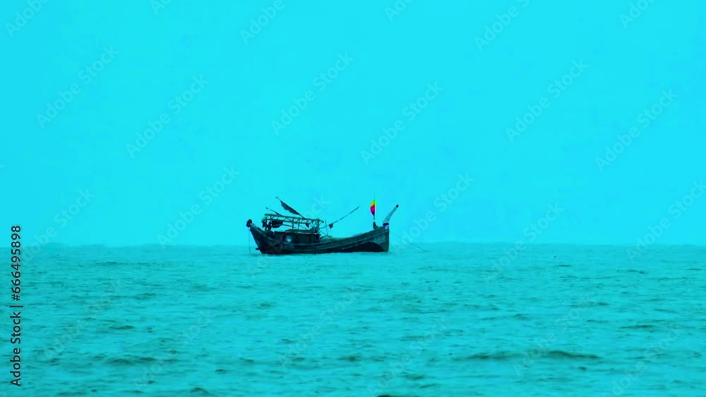 Blue hour background as fishing trawler working in the Indian Ocean