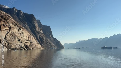 Wallpaper Mural Epic view of Ø Fjord with floating by small icebergs in beautiful light. Scoresbysund, Greenland. Torontodigital.ca