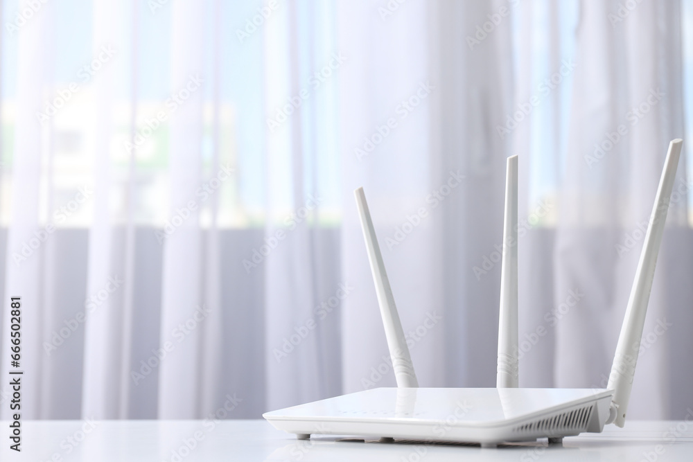 Wi-Fi router on light background, space for text Wi-Fi router on light background, space for text