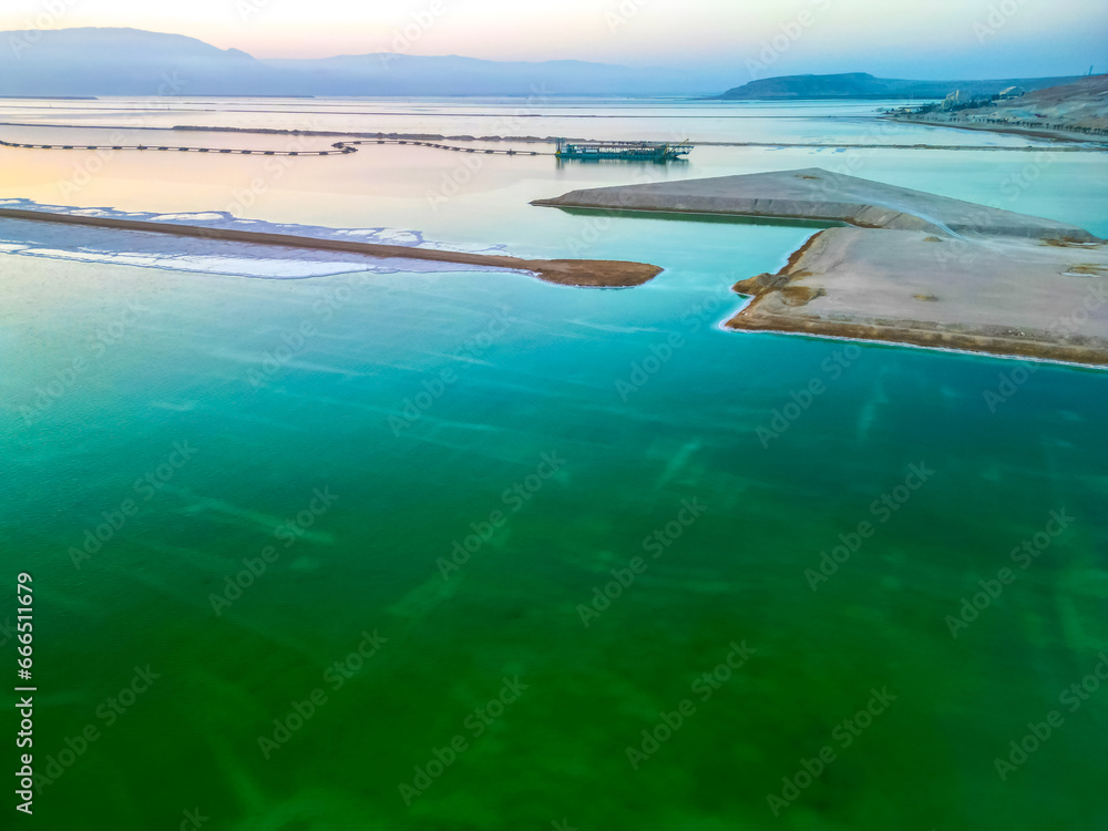 Drone photo of the Dead Sea, Israel, salty coast, Hotels and Spa centers in Ein Bokek area. Climatotherapy on Psoriasis