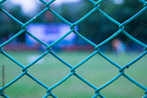 Wire Fence Mesh Pattern Abstract Background of The Close-Up Shot in Soccer Field