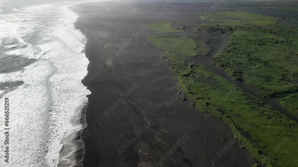 Top view flying drone of amazing nature view Black Sand Beach, Iceland Top view flying drone of amazing nature view Black Sand Beach, Iceland