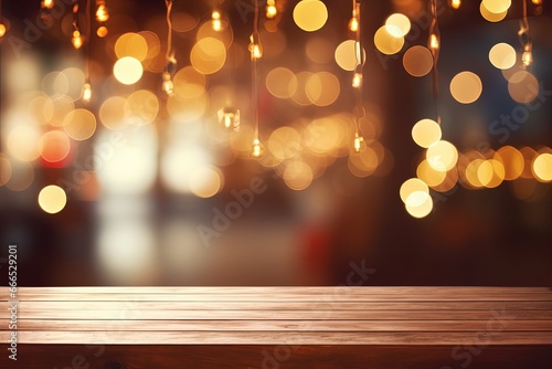 Bokeh lights create blurry restaurant background on empty wooden table