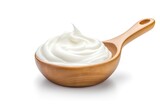 White background isolated objects sour cream mayonnaise yogurt in wooden spoon