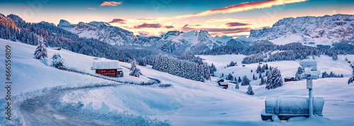 Panoramic morning view of Alpe di Siusi village. Majestic winter sunrise in Dolomite Alps. Superb landscape of ski resort, Ityaly, Europe. Beauty of nature concept background. © Andrew Mayovskyy