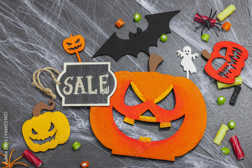Sale concept, traditional festive composition for Halloween party. Funny props, homemade decor