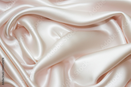 cream silk textured fabric surface © Ruslan