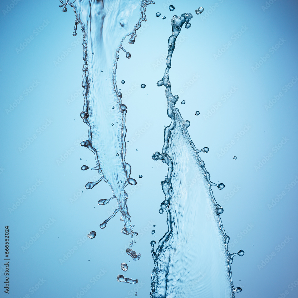 Water splash against a blue background Water splash against a blue background