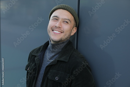 Handsome ethnic man close up portrait 