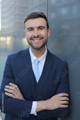 Wallpaper Mural Businessman with a sophisticated look crossing his arms Torontodigital.ca