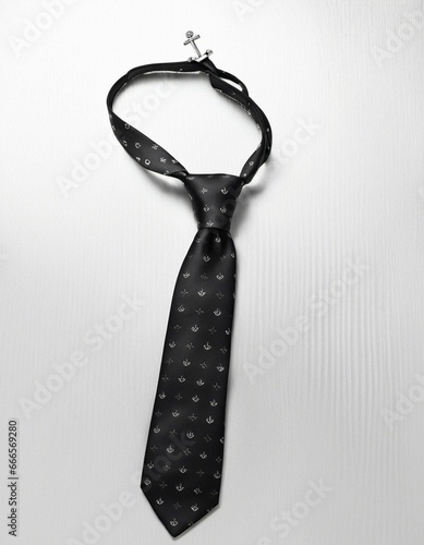 AI generated illustration of Aablack formal men's necktie on a white background photo