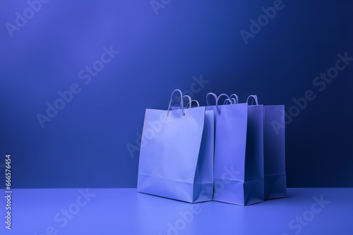 Empty blue shopping bag on a blue background. Banner. Sale.