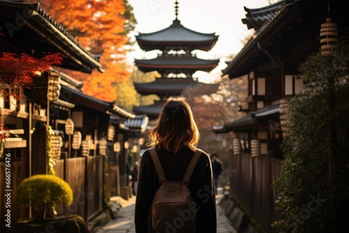 Woman exploring traditional Japanese architecture in City.