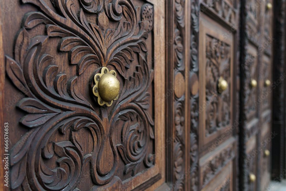 traditional swahili doors made of wood and brass as found in Tanzania and Zanzibar
 - obrazy, fototapety, plakaty 