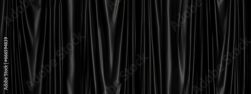 Seamless black theater curtains background. Luxurious silky velvet tileable drapes texture. Repeat pattern for performance, promotion backdrop photo