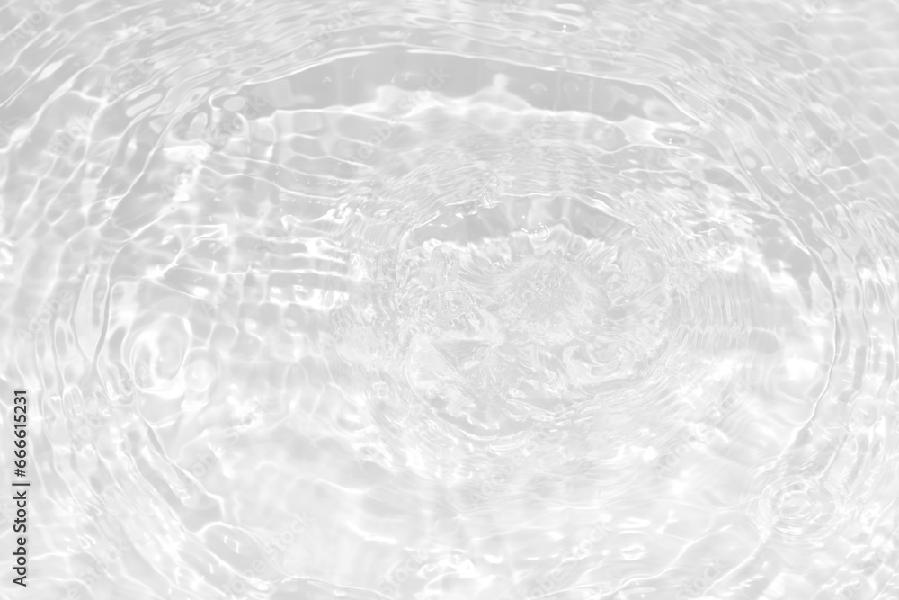 Defocus blurred transparent white colored clear calm water surface texture with splashes reflection. Trendy abstract nature background. Water waves in sunlight with copy space. Blue watercolor shine.
