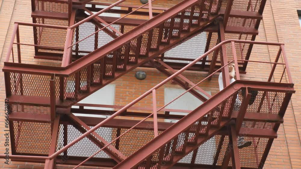 Hurry young businessman running down on stair late for work. Manager hastily climbing down staircase being going to office. Entrepreneur with briefcase going to job. Concept of morning commute Hurry young businessman running down on stair late for work. Manager hastily climbing down staircase being going to office. Entrepreneur with briefcase going to job. Concept of morning commute