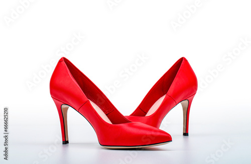 Red high heel women shoes on white background. Red shoe for women. Beauty and fashion concept. Fashionable women shoes isolated on white background