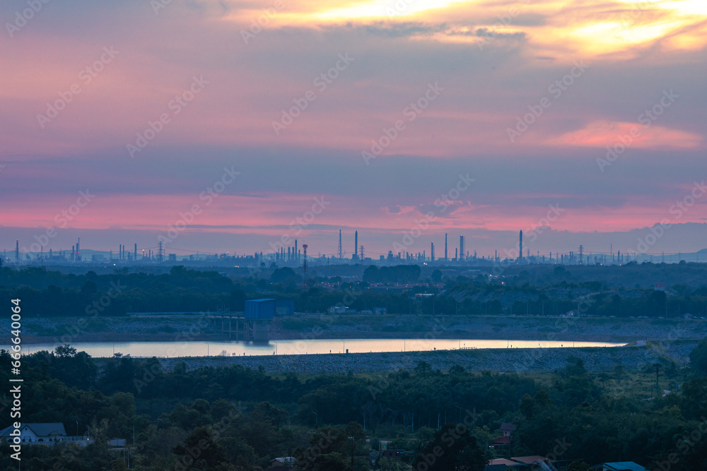 The background of the sea by the evening sea, with natural beauty (sea water, rocks, sky) and fishermen are fishing by the river bank, is a pleasure during travel.