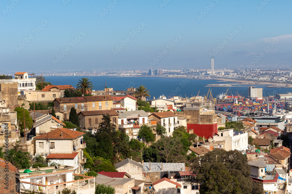 Beautiful panorama of the bay of Algiers, Alger, Algeria, with the industrial port and the Djamaa El-Djazaïr (English : Great Mosque) in the background.