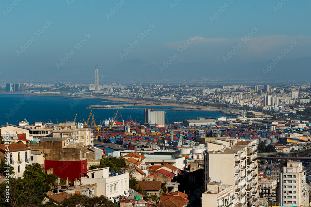 Algiers, Alger, Algeria, 10 19 2023 : Beautiful panorama of the bay of Algiers, with the industrial port and the Djamaa El-Djazaïr (English : Great Mosque) in the background.