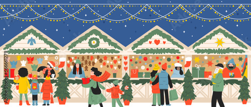 Christmas market. Kiosks of gifts, food and hot drinks. People walk,  eat, celebrate and shopping in the evening city.