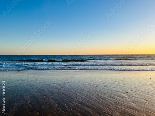 Evening quiet sea horizon  seascape background  sandy coast