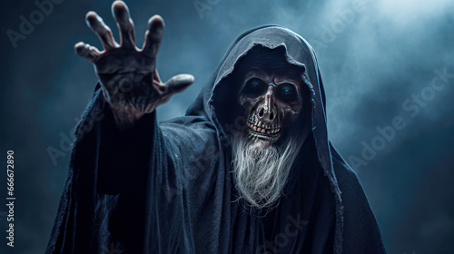 Halloween concept. Scary dark man in death costume with skull on dark background