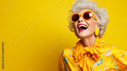 mature woman wearing sunglasses and yellow shirt