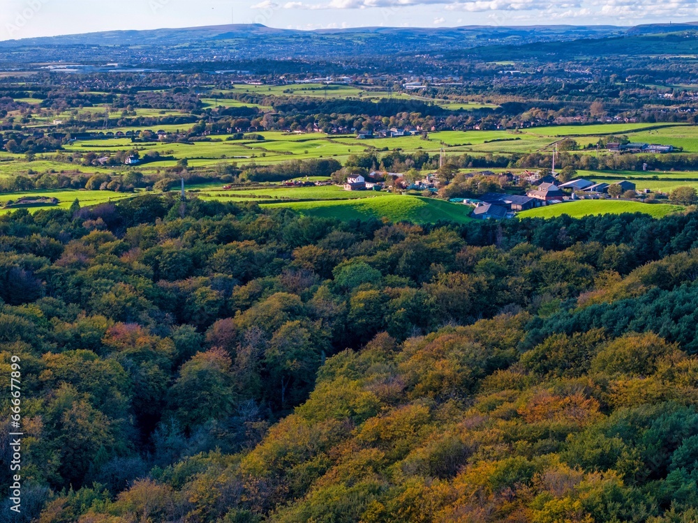 Aerial view of Tandle Hill country Park in Greater Manchester during the season of Autumn