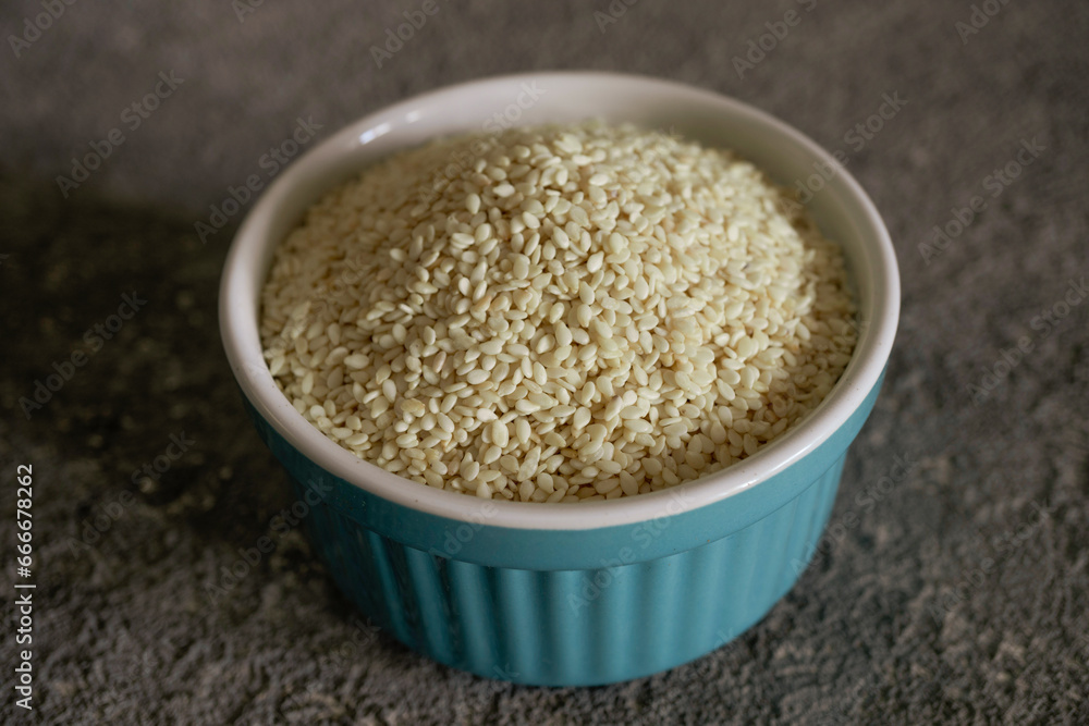 Sesame grains in a bowl, close-up, vegetarian food, healthy food