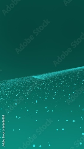 Blue tiny dots glitter on green turquoise gradient background that fly down from the middle of the frame. Vertical abstract stars backdrop party or Christmas holidays and New Year concept copy space